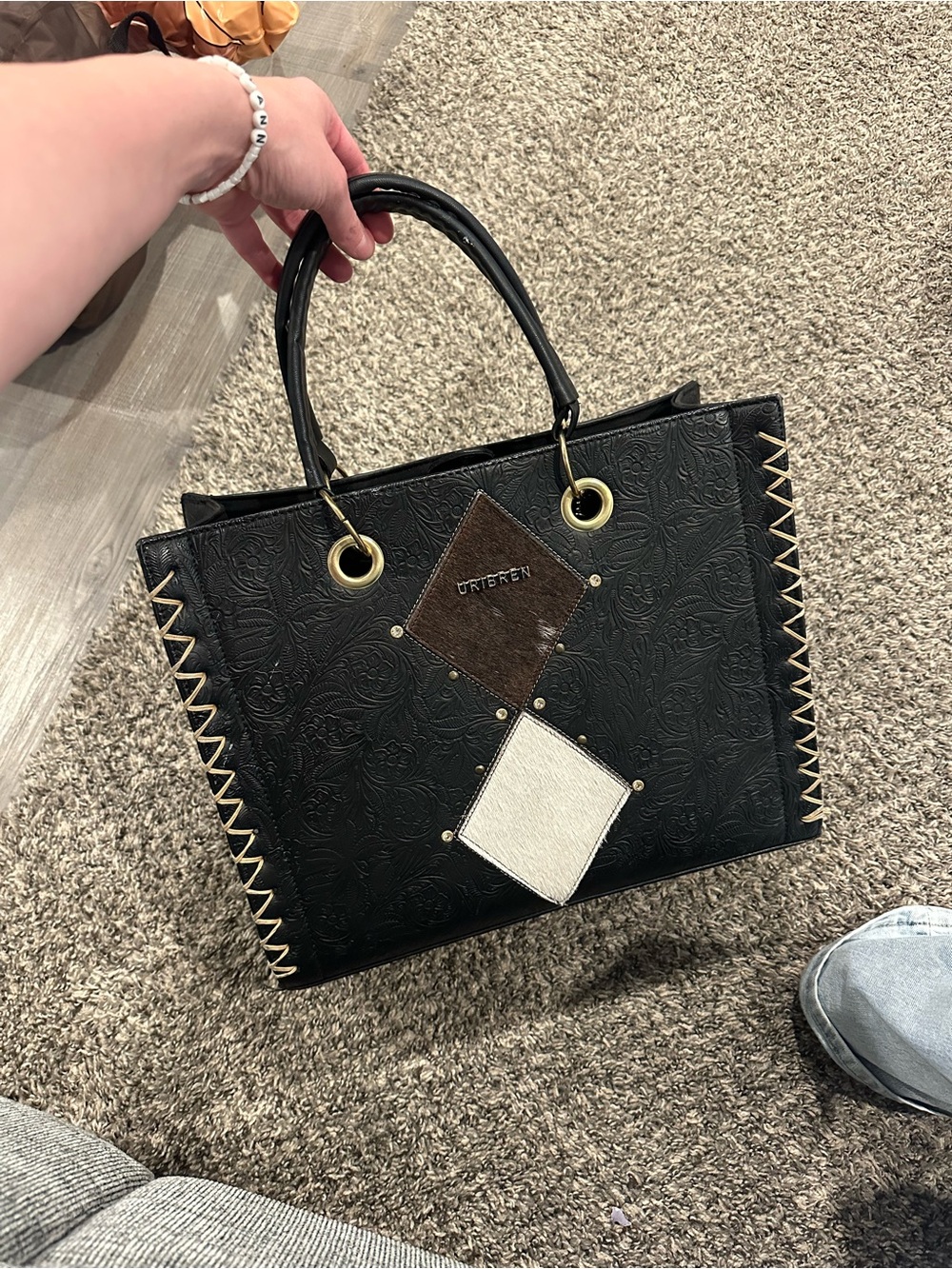 Black Embossed Tote with Brown and Cream Diamond Accents